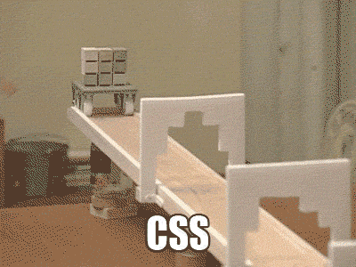 a 3x3 stack of blocks on wheels rolls down a little obstacle course where a sequence of cutout tunnels knock bricks away until just one remains, caption says “CSS”
